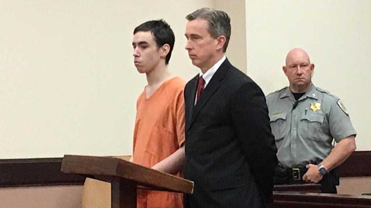 Jacob Matthew Morgan and his attorney, 16th Circuit deputy public defender B.J. Barrowclough, in court Tuesday morning to plead guilty to involuntary manslaughter and unlawful conduct toward a child in connection with the death last year of his 14-month-old brother, Joshua Hill.