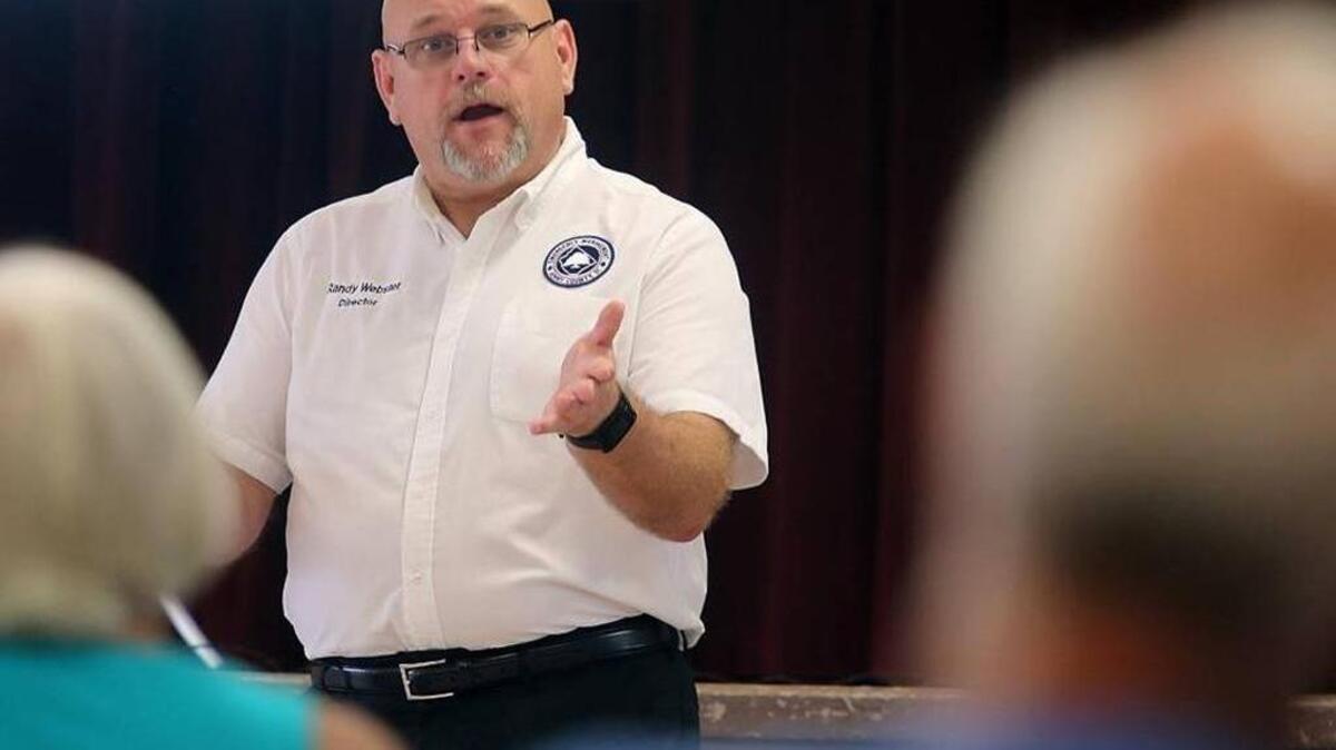 Horry County Emergency Management Director Randy Webster talks to the gathering in the “Know Your Zone” meeting at the Base Recreation Center on Aug. 10.