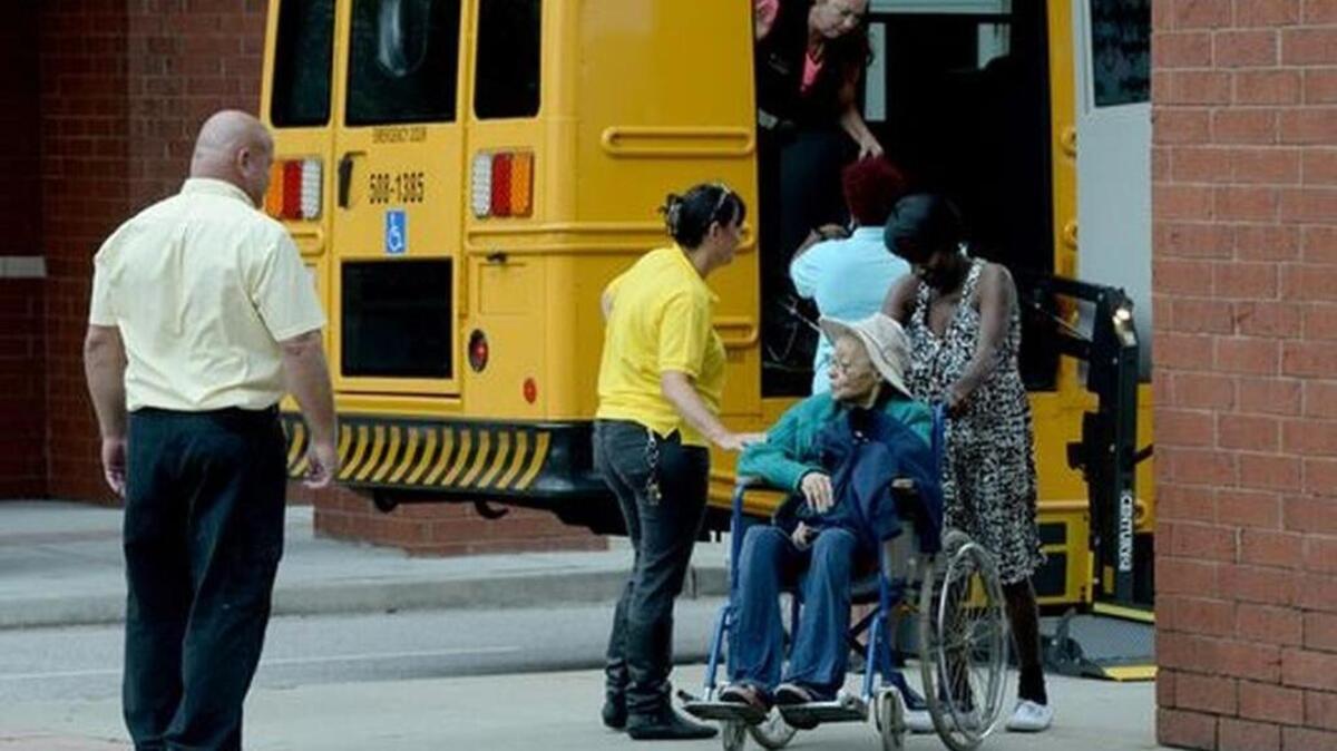 North Charleston residents arrive at the Charleston Area Convention Center to be evacuated to the Upstate of South Carolina in preparation for Hurricane Matthew on Wednesday. Buses to the Upstate did not leave as planned.