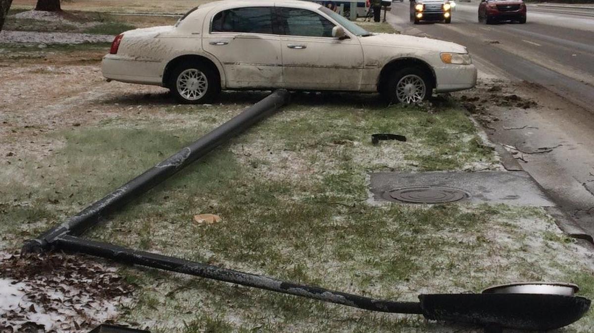 A driver hit a patch of ice and lost control of her vehicle on S.C. 161, running into the light post. The driver was uninjured.