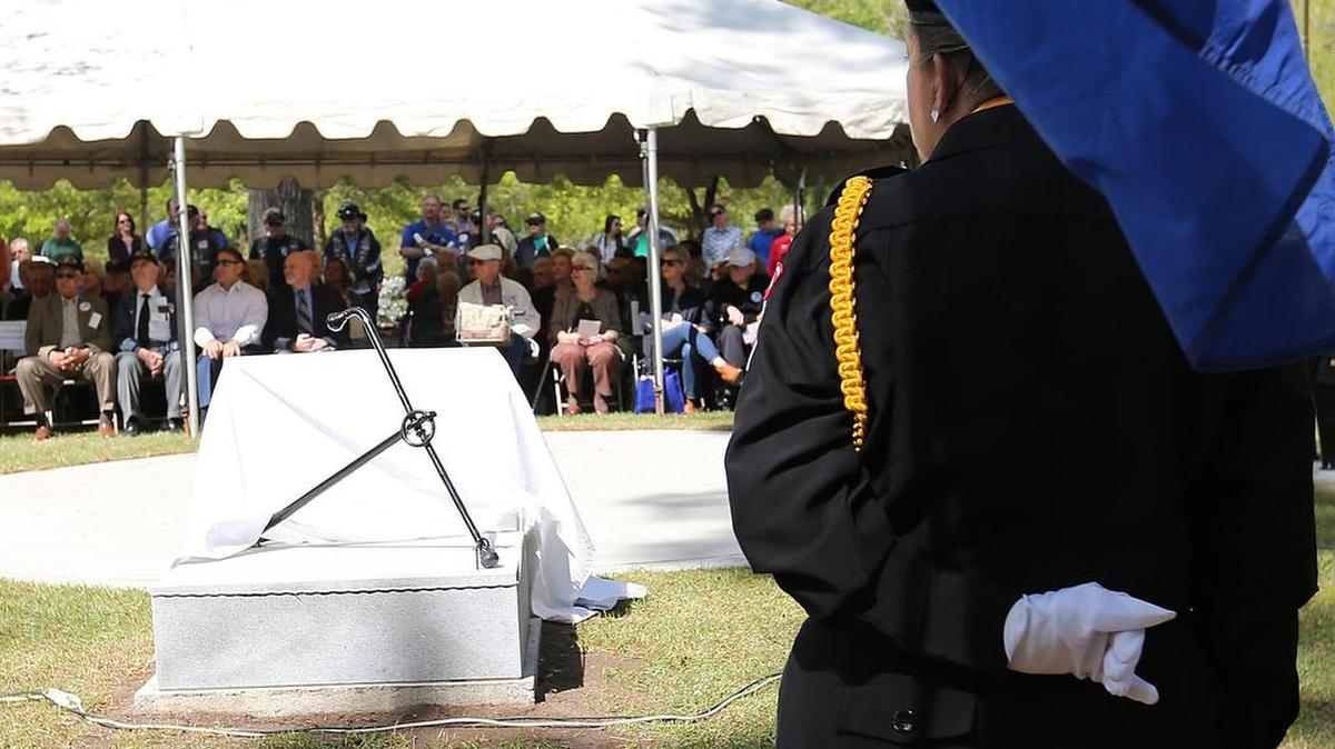 Merchant Mariners, their families and other veterans attend the John T. Schmidt Palmetto Mariners Chapter American Merchant Marines Veterans monument unveiling on Friday, April 8, 2016, at Warbird Park near The Market Common.