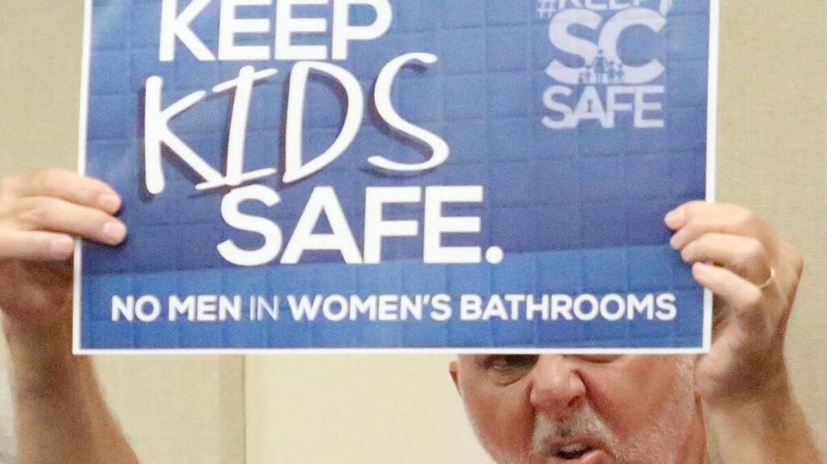 Hundreds gather at an Horry County Schools meeting relating to transgender students bathroom use on Monday, May 2, 2016. As the board was in executive session the group began singing and praying until a woman stood to ask why all students shouldn't have the same rights. Her questions and responses to their questions were occasionally drowned out by singing and shouting. When the board reconvened, it approved a resolution to follow the Title IX ruling but support a Virginia school district challenging the ruling.