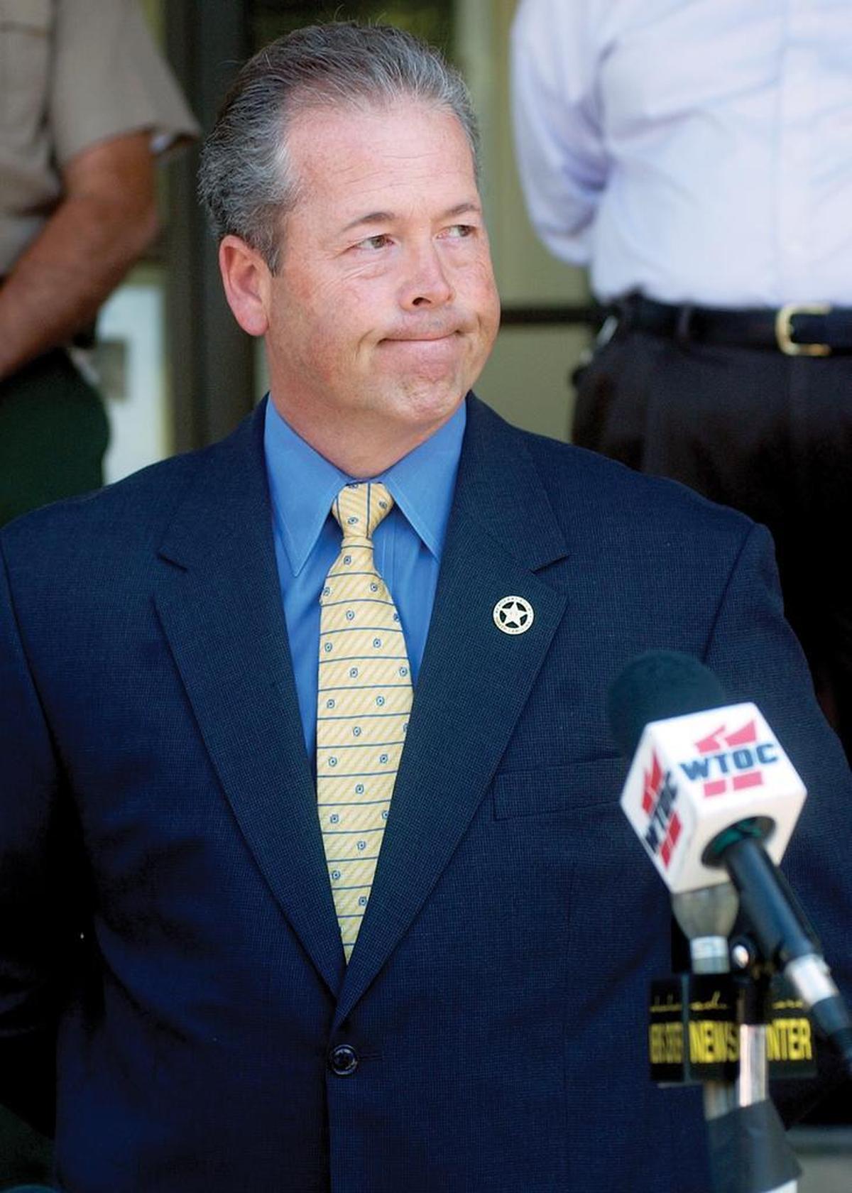 Beaufort County Sheriff P.J. Tanner listens to a question during a press conference regarding the disappearance of John and Elizabeth Calvert and the suicide of Dennis Gerwing.