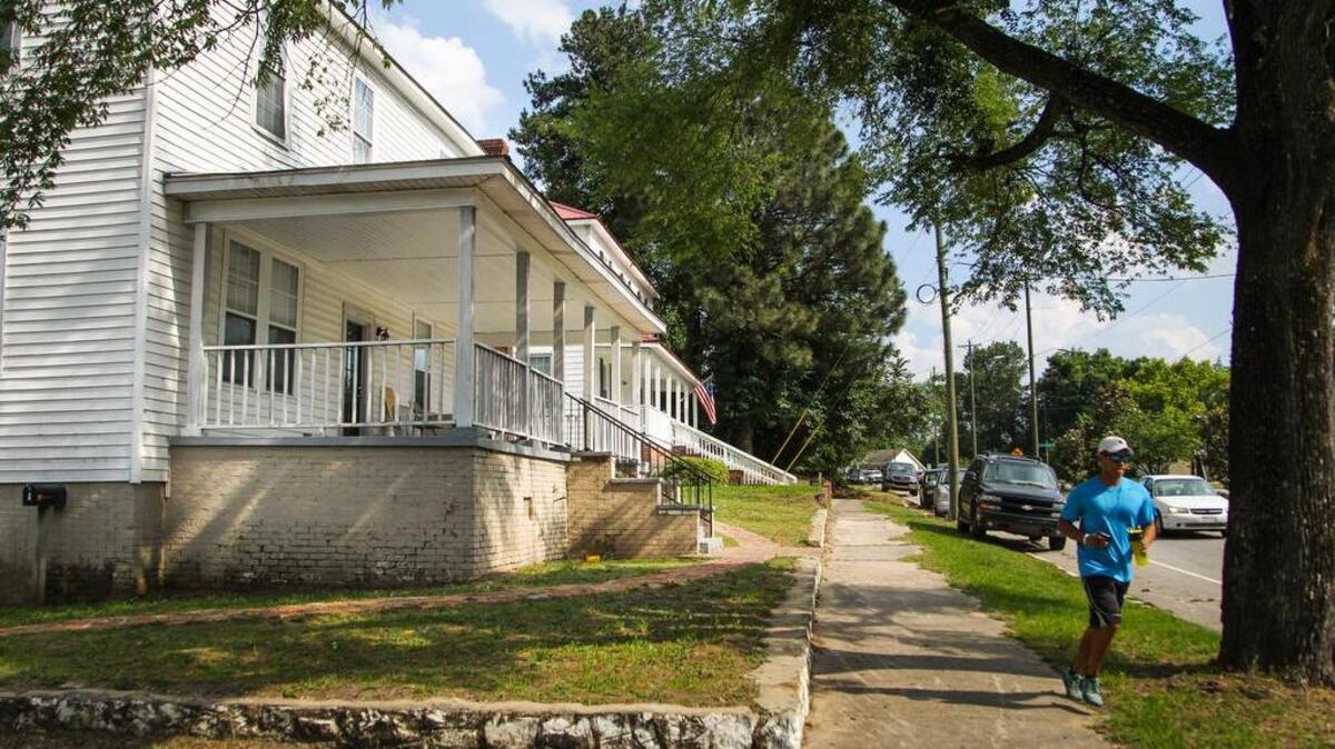 Olympia’s housing stock is dominated by wooden homes built for people who worked in the area’s three now-shuttered textile mills, which have been converted into apartments.