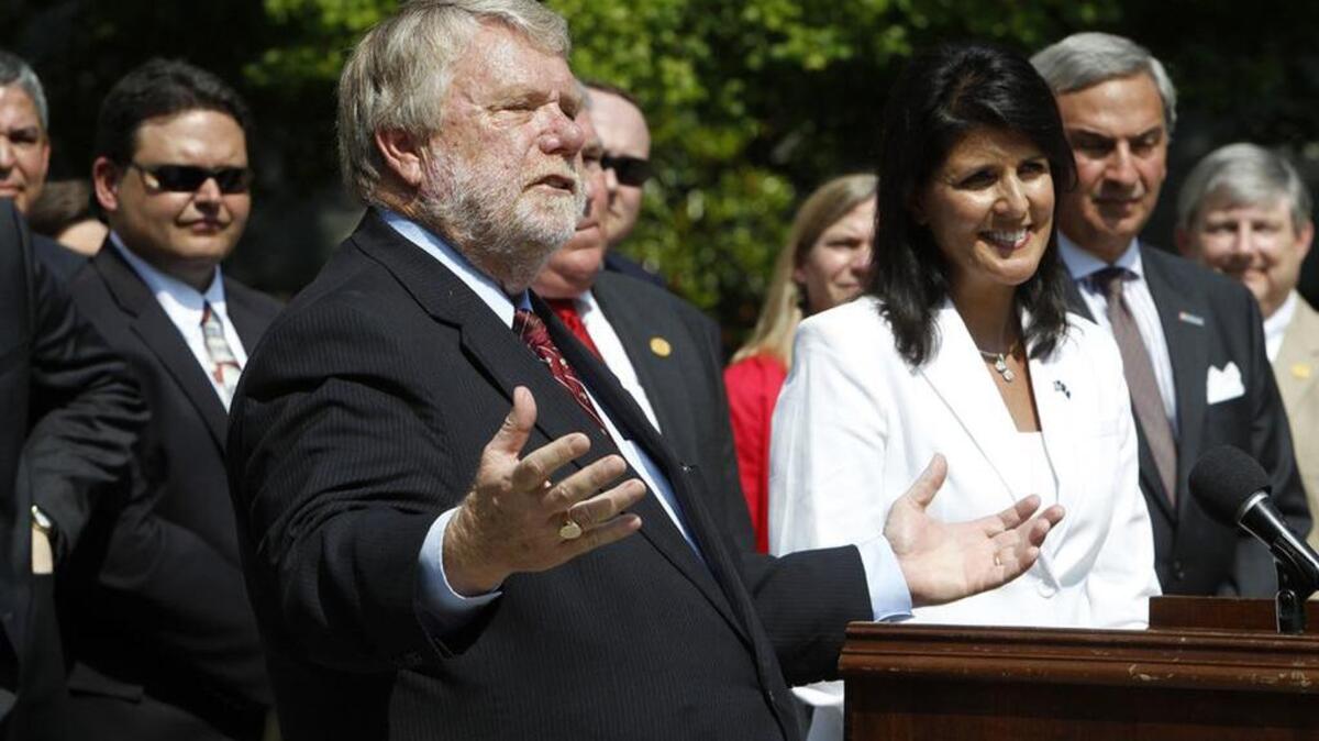 
Commerce Secretary Bobby Hitt is joined by Gov. Nikki Haley and state officials to announce that Volvo is building a $500 million factory in Berkeley County to produce 100,000 cars a year. Soon we’ll know more about how much taxpayers pay for such projects.
