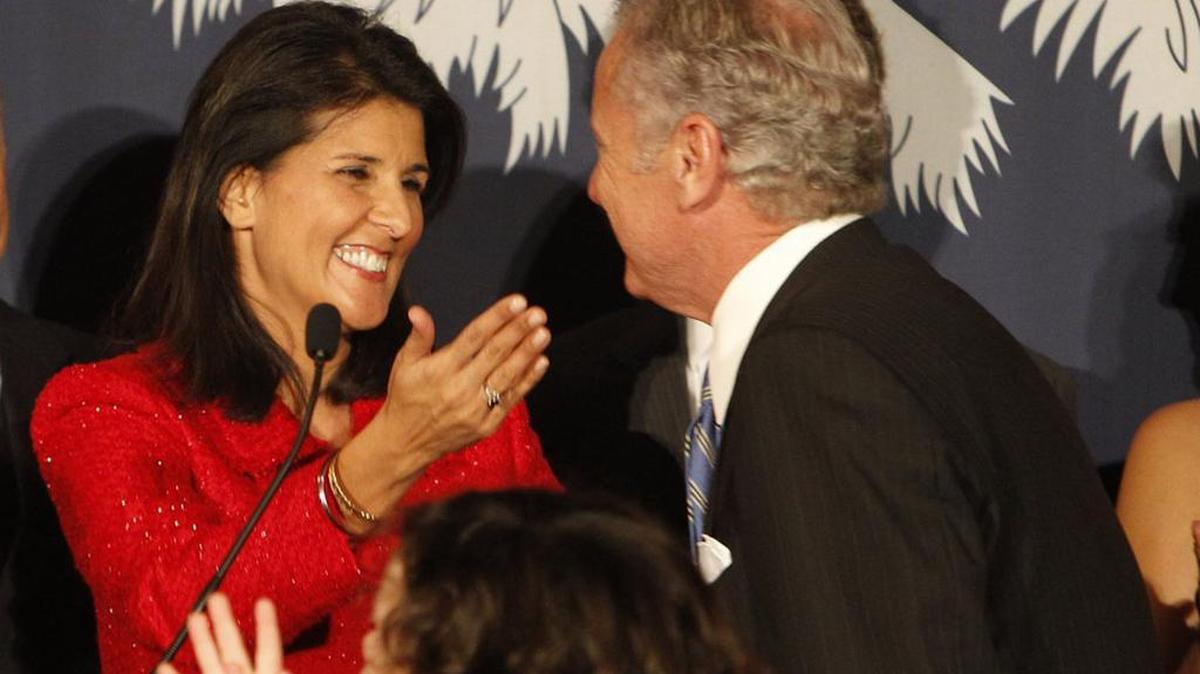 SC Gov Nikki Haley hugs Lt Gov Henry McMaster after their 2014 election victories.