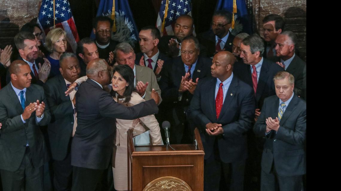
SC Gov Nikki Haley hugs US Rep James Clyburn after she called for legislators to remove the Confederate flag from the grounds of the State House.
