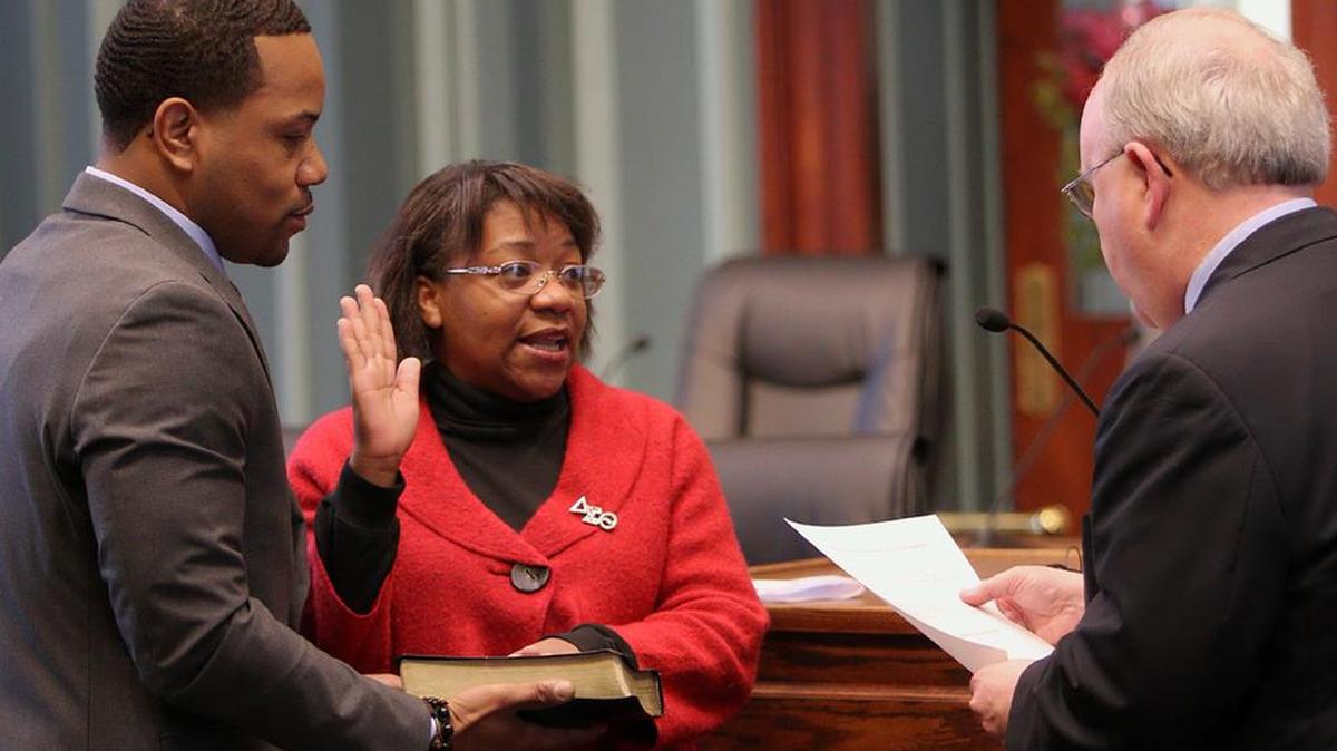 
Columbia City Councilwoman Tameika Isaac Devine is sworn in to her third term by former mayor Bob Coble during of a 2012 ceremony at City Hall.
