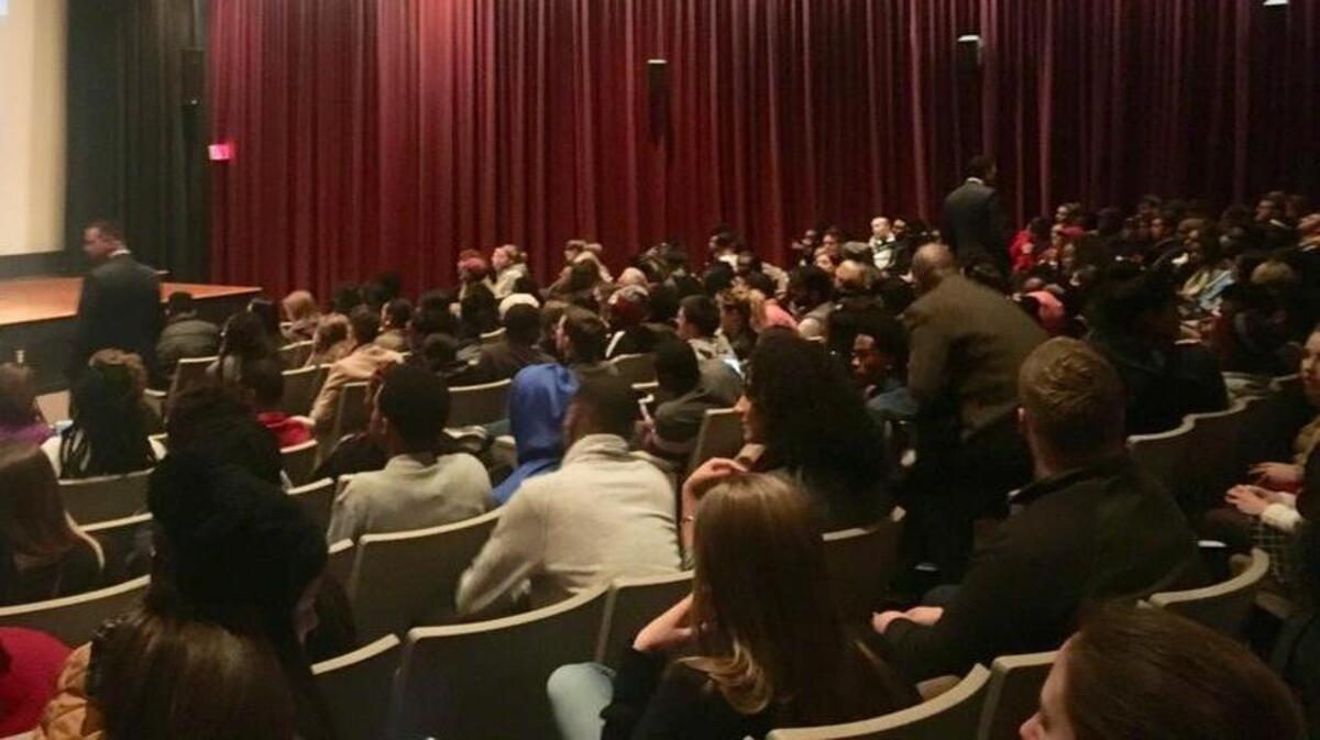 A racially diverse crowd of about 300 students packed into a USC theater to express their anger about racist flyers posted on campus.