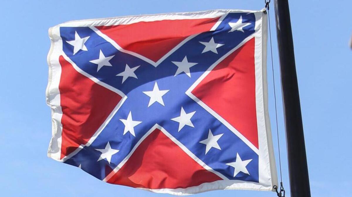 
The Confederate battle flag hangs
