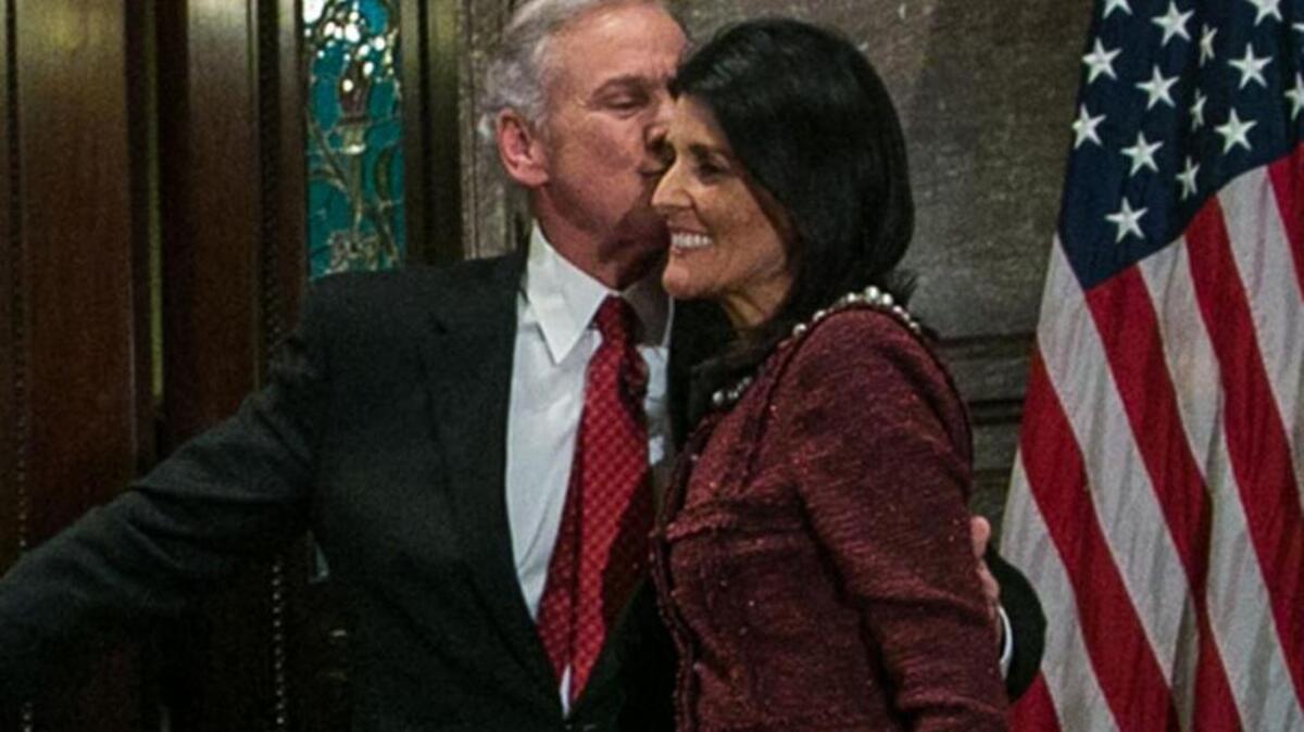 SC Gov Henry McMaster hugs former Gov Nikki Haley after he was sworn in on Jan 24.