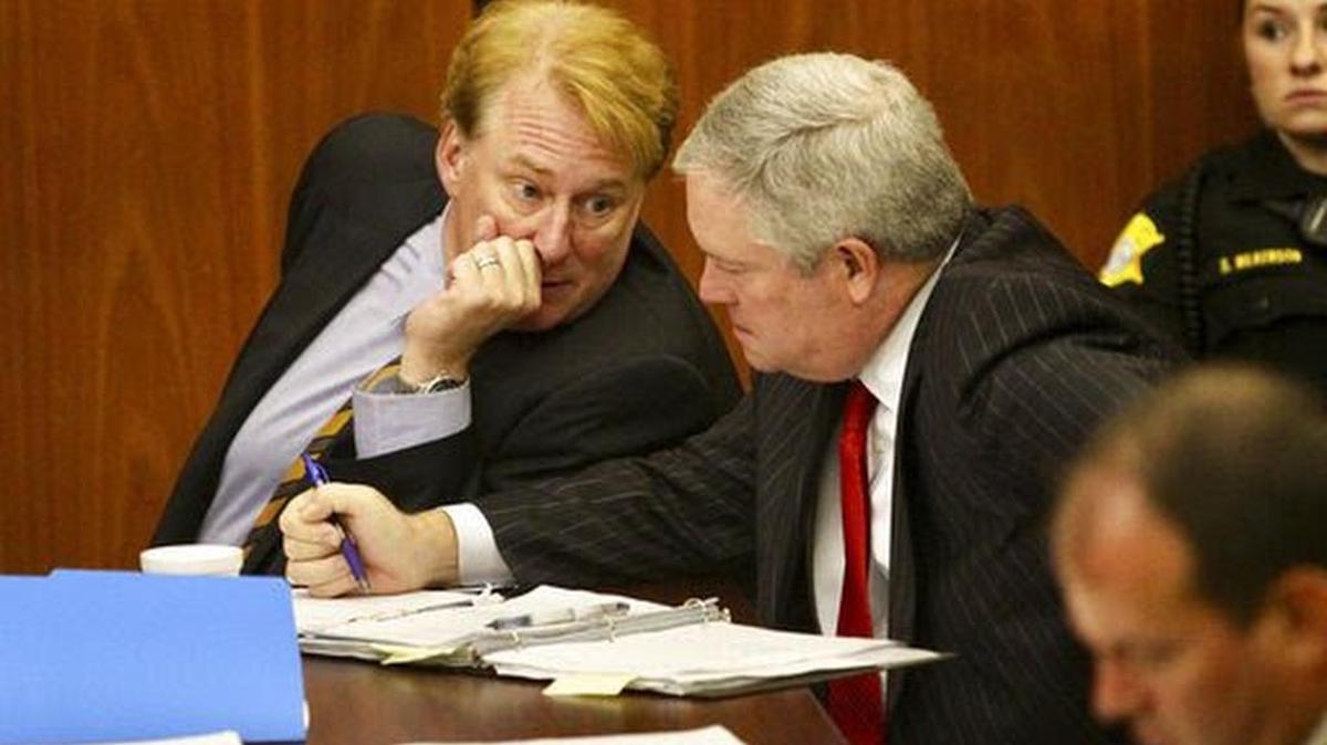 SC Rep Rick Quinn talks with his attorney during a hearing to get Solicitor David Pascoe disqualified from his prosecution.