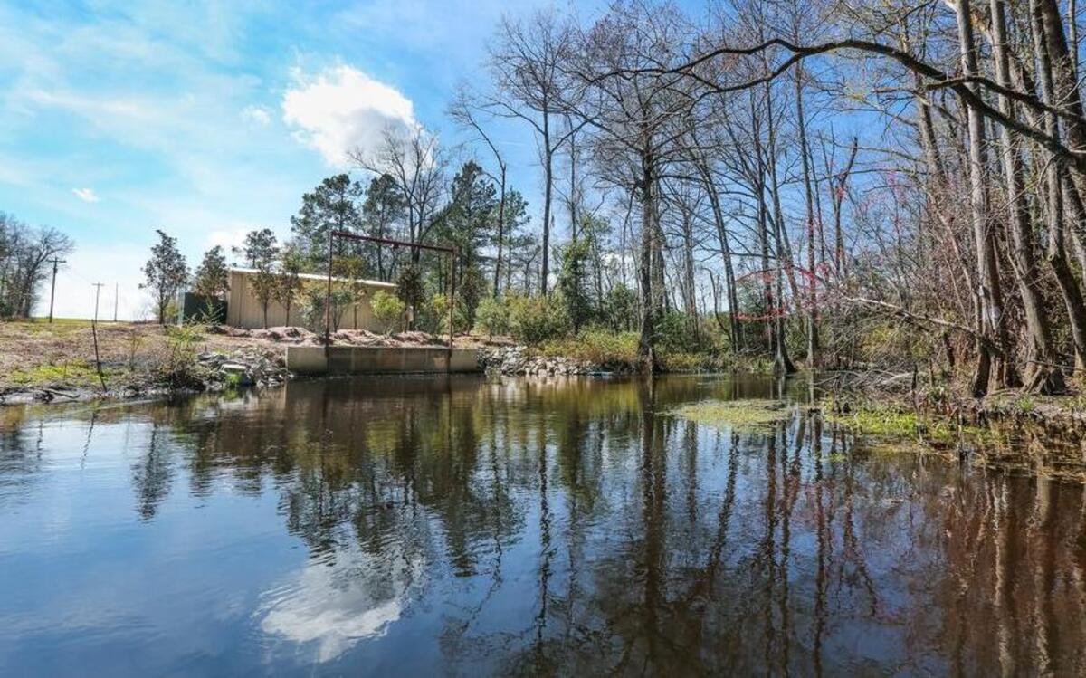 A large irrigation intake pump sits on the bank of the Edisto River. Nearby residents are concerned that a mega potato farm and other farms are allowed to take too much water from the Edisto and lower the river to dangerous levels.