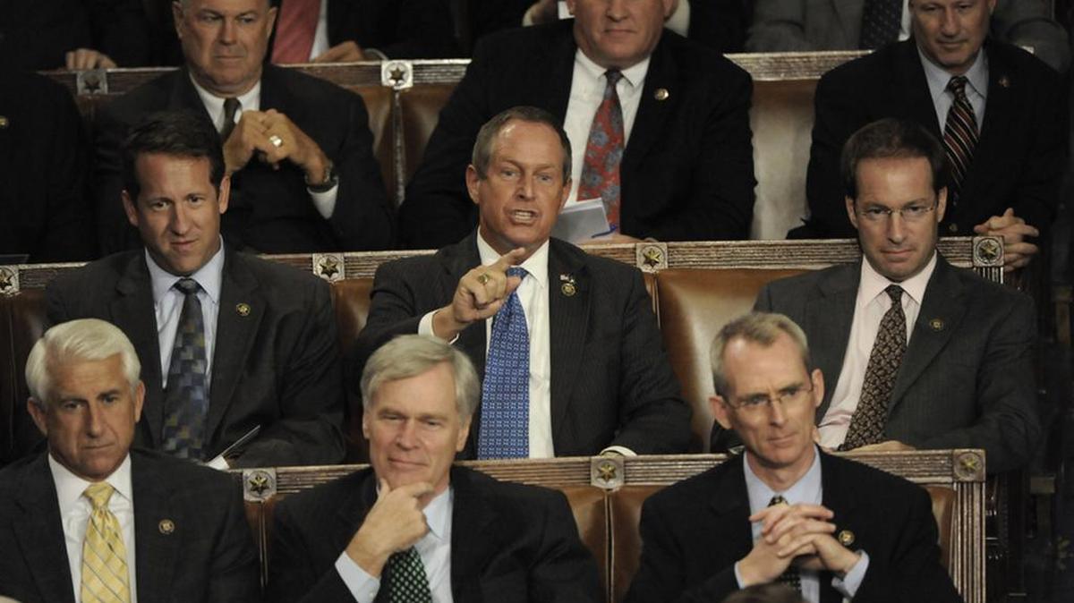 US Rep Joe Wilson points and says “You lie!” as President Barrack Obama discusses his health-care plan in a 2009 joint session of Congress.