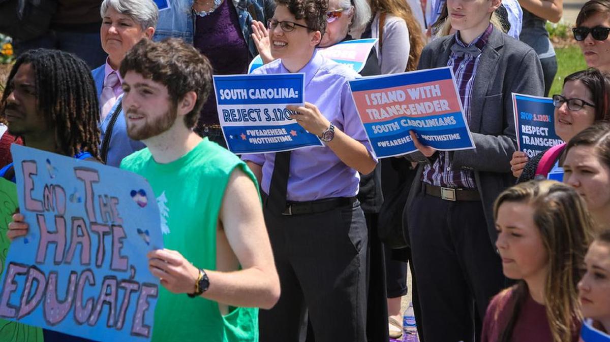 Members of USC’s Trans Student Alliance rally at the State House to protest a bill that would ban transgender people from using the bathroom of their choice.