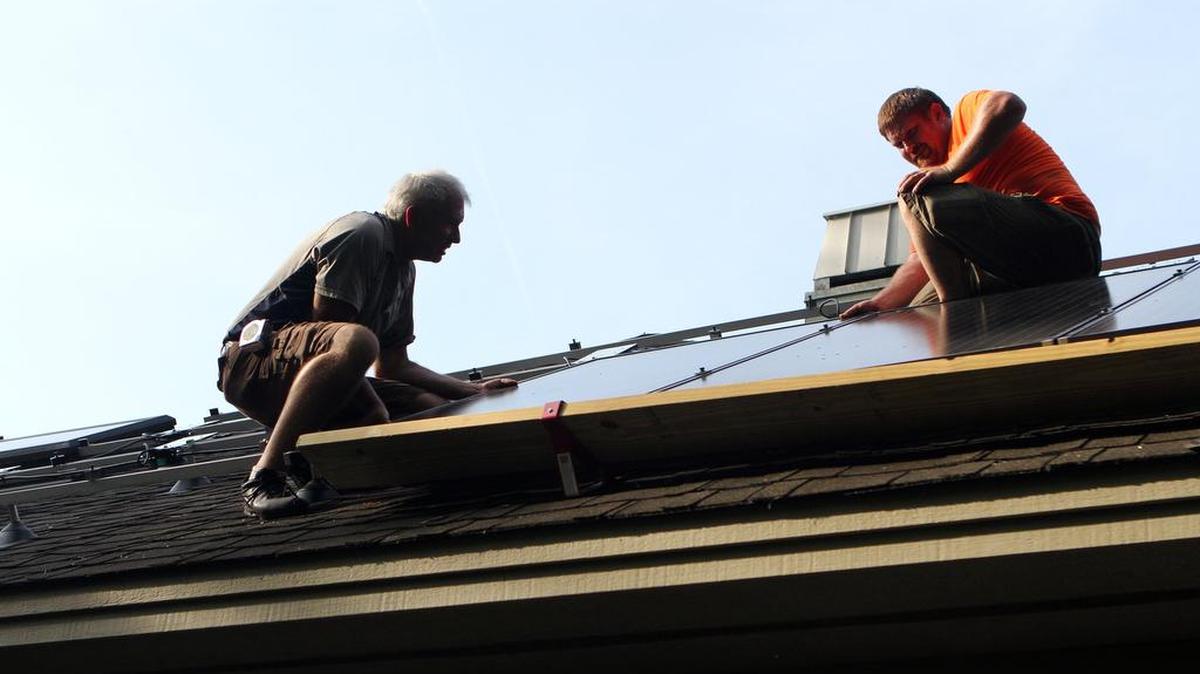Solar panels are installed on the roof of a Bluffton home.