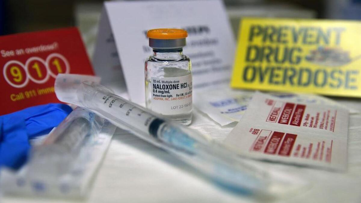 An overdose of opiates makes the body forget to breathe. Naloxone blocks the brain receptors that opiates latch onto, helping the body remember to breathe.