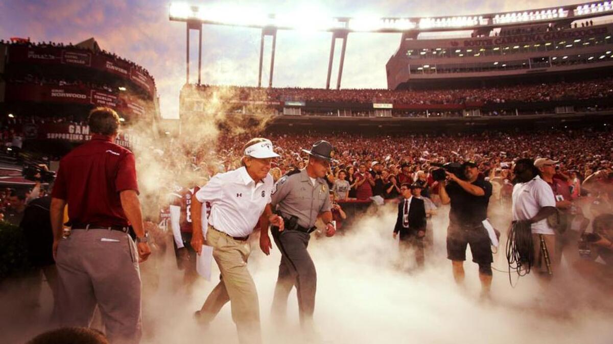 Then-South Carolina head coach Steve Spurrier heads onto the field for the Gamecocks game against Kentucky at Williams-Brice Stadium on Sept. 12.