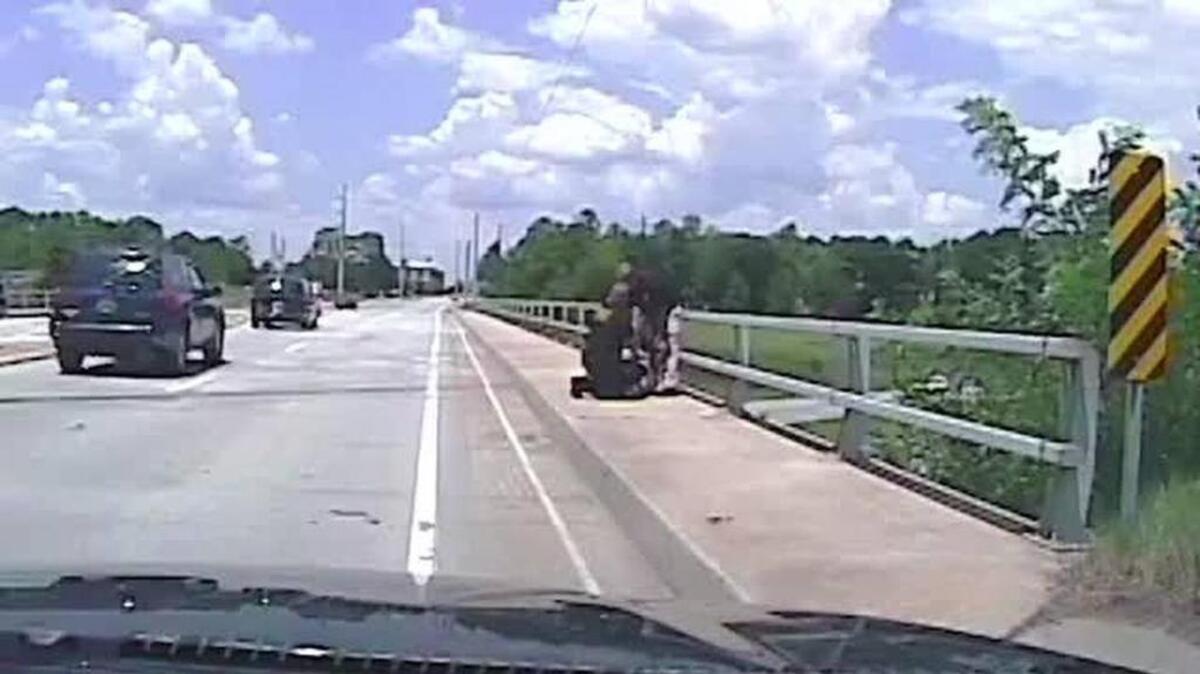 A man was just short of taking his life by leaping from a highway overpass when two Richland County deputies stepped in.
