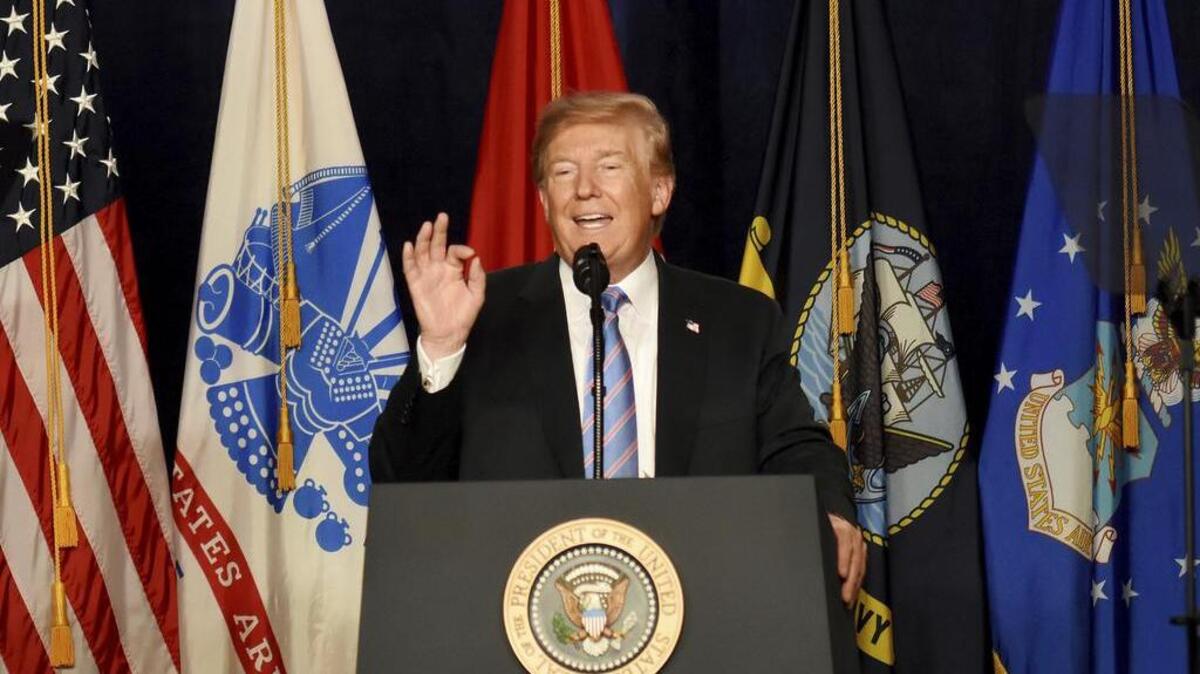 President Donald Trump speaks at a Salute to Service charity dinner on Tuesday.