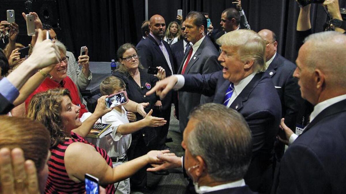Donald Trump greets supporters in Greenville.