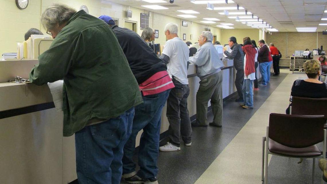 Motorists visit a Department of Motor Vehicles office in Columbia in February.