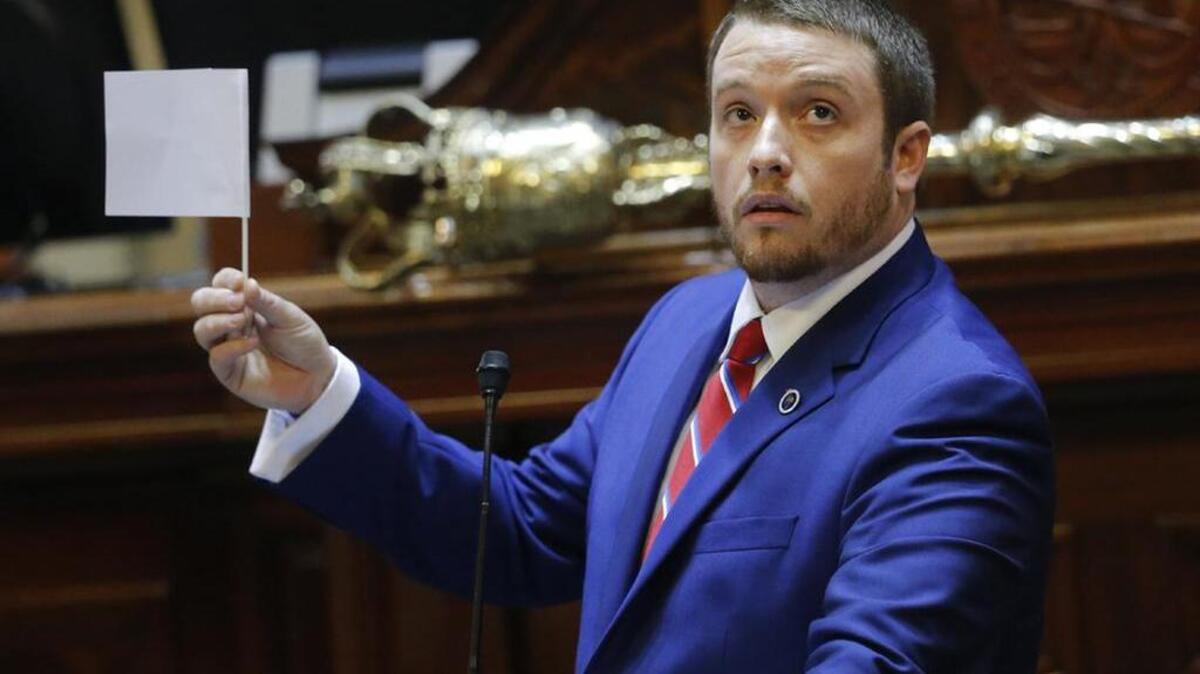 Rep. Chris Corley proposes replacing the Confederate flag on the State House grounds with a white flag of surrender.