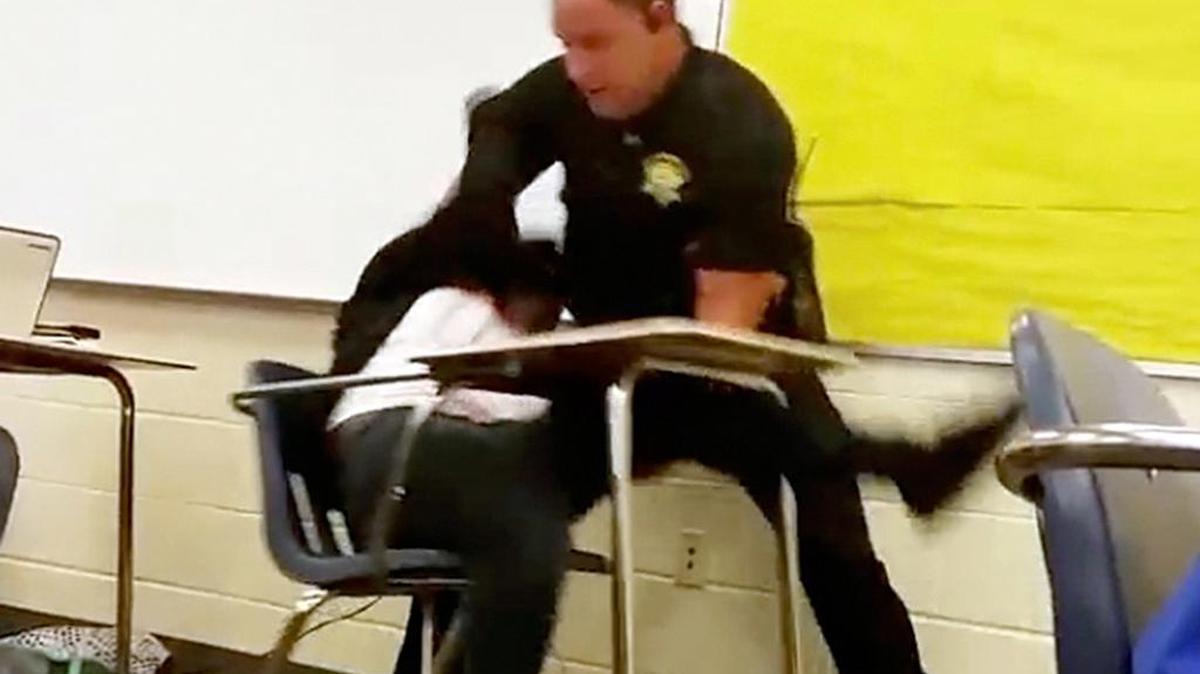 This photo of a video taken by a Spring Valley High School student shows Senior Richland County Deputy Ben Fields trying to remove a student who refused to leave her math class.