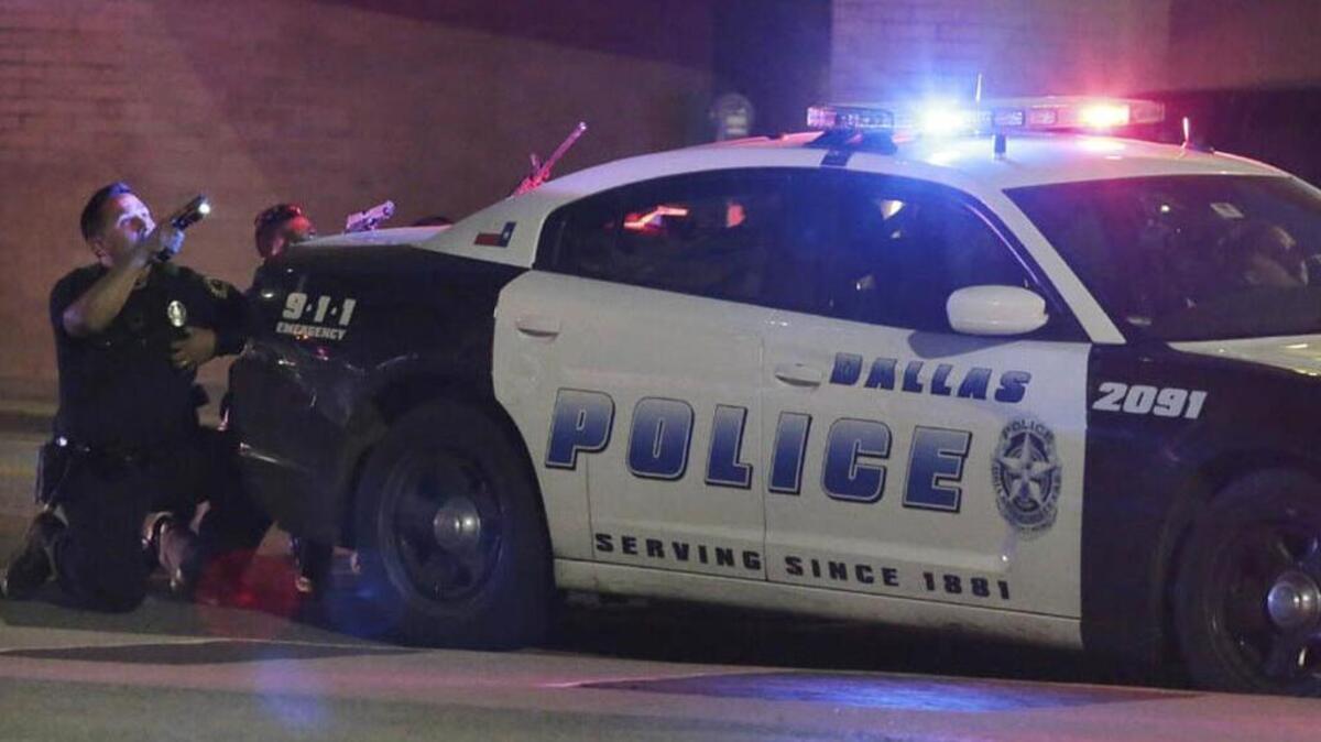 Dallas police respond to a shooter who killed five of their colleagues in July.
