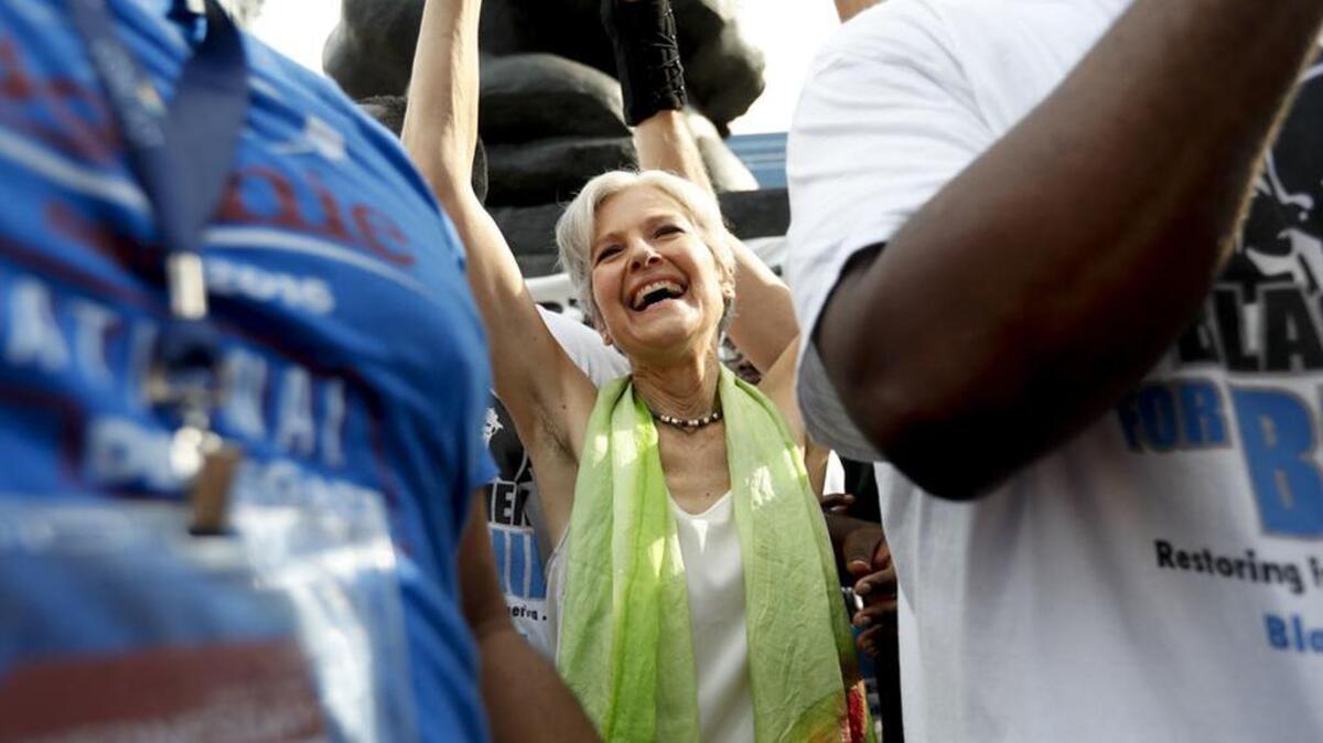 Jill Stein, presumptive Green Party presidential nominee, waves at a rally in Philadelphia during the Democratic National Convention.