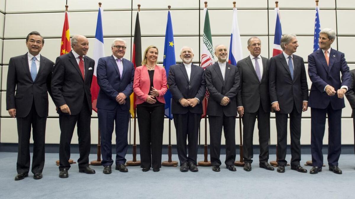 
Chinese Foreign Minister Wang Yi, French Foreign Minister Laurent Fabius, German Foreign Minister Frank-Walter Steinmeier, European Union High Representative Federica Mogherini, Iranian Foreign Minister Mohammad Javad Zarif, Head of the Iranian Atomic Energy Organization Ali Akbar Salehi, Russian Foreign Minister Sergey Lavrov, British Foreign Secretary Philip Hammond and US Secretary of State John Kerry pose for a group picture at the United Nations building in Vienna, Austria, just before announcing an agreement on the Iranian nuclear program.
