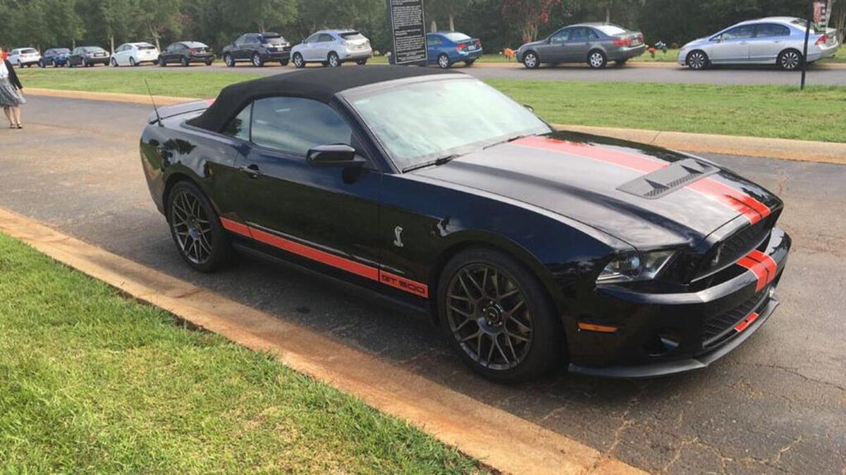 Jesse Teel’s garnet and black convertible