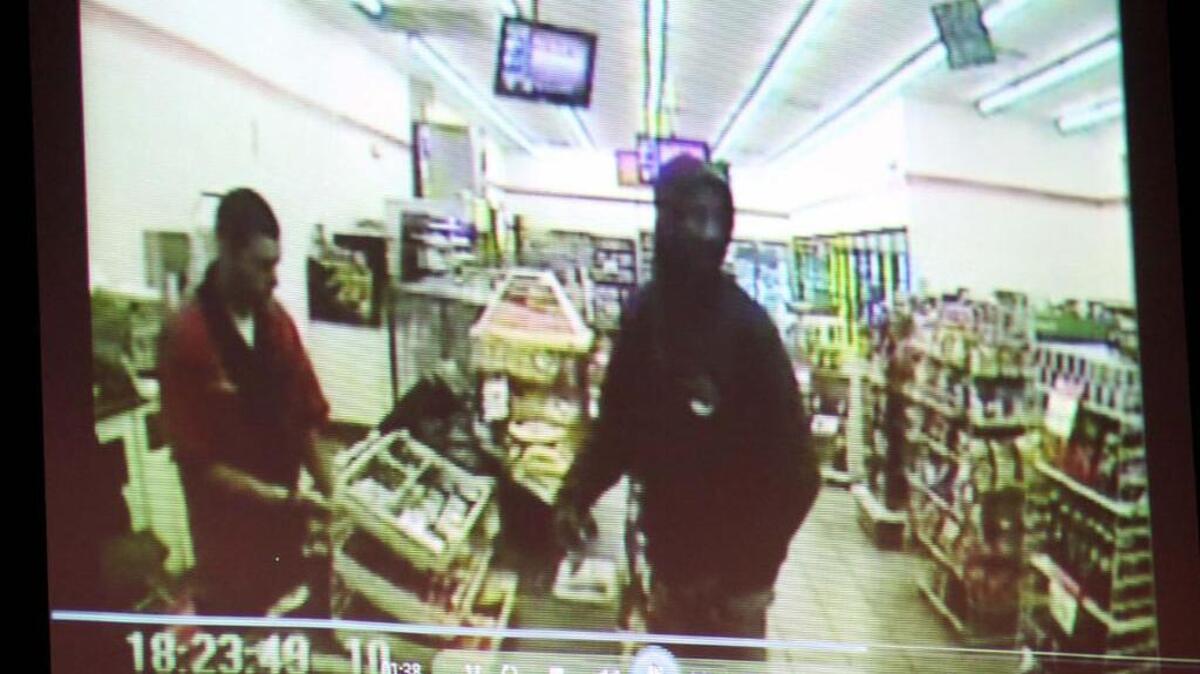A video shows Trayvon Martin, right, at the 7-11 on the night he was killed.