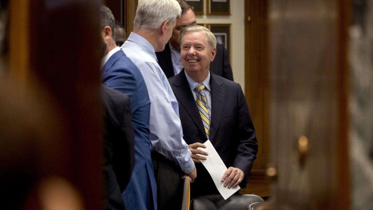 US Sens Bill Cassidy and Sen. Lindsey Graham speak before Monday’s Senate Finance Committee hearing to consider their health-care proposal.