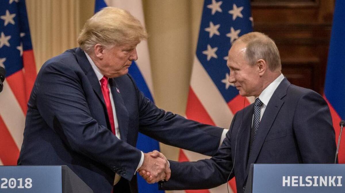 U.S. President Donald Trump and Russian President Vladimir Putin shake hands during a joint press conference after their summit on July 16.