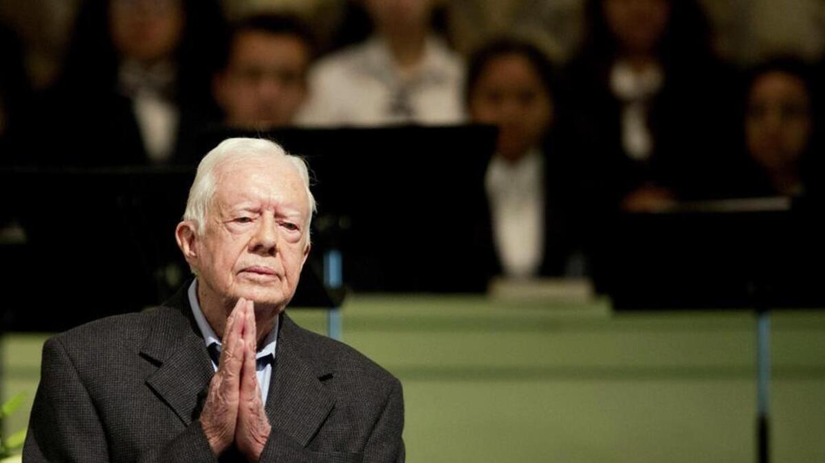 
Former President Jimmy Carter teaches Sunday School class at Maranatha Baptist Church in his hometown of Plains, Ga, on Sunday. It was his first lesson since detailing the intravenous drug doses and radiation treatment planned to treat melanoma found in his brain after surgery to remove a tumor from his liver.
