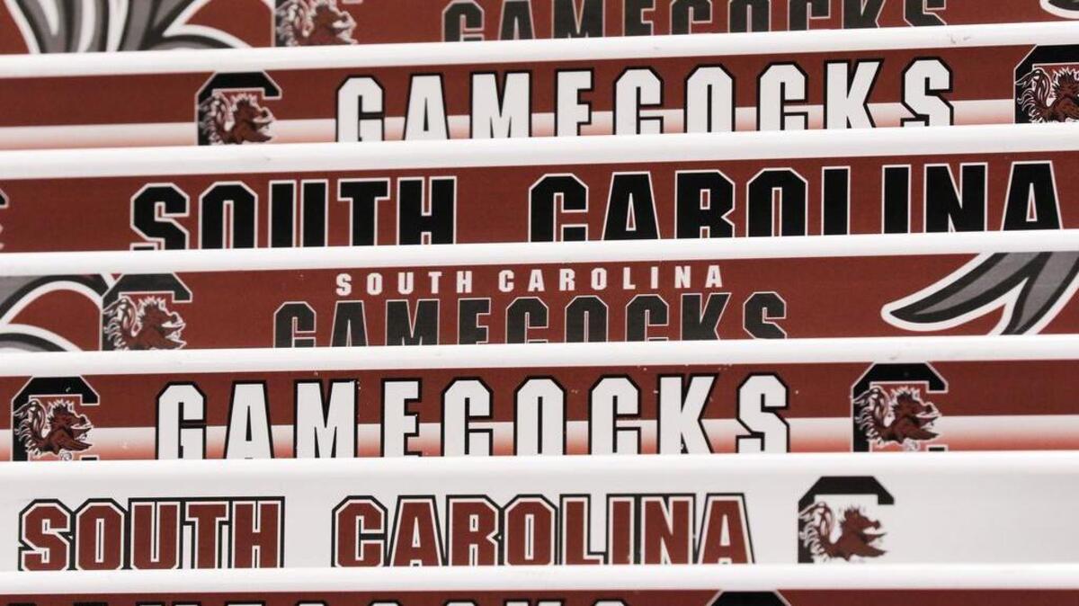 Gamecock logos line up on the hurdles in the new indoor track and field complex at USC.