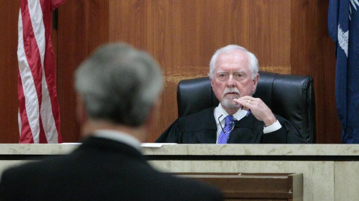 Judge Thomas Cooper listens Tuesday to arguments from James Smith, representing the SC Department of Revenue against Richland County concerning the use of the county’s penny transportation sales tax.