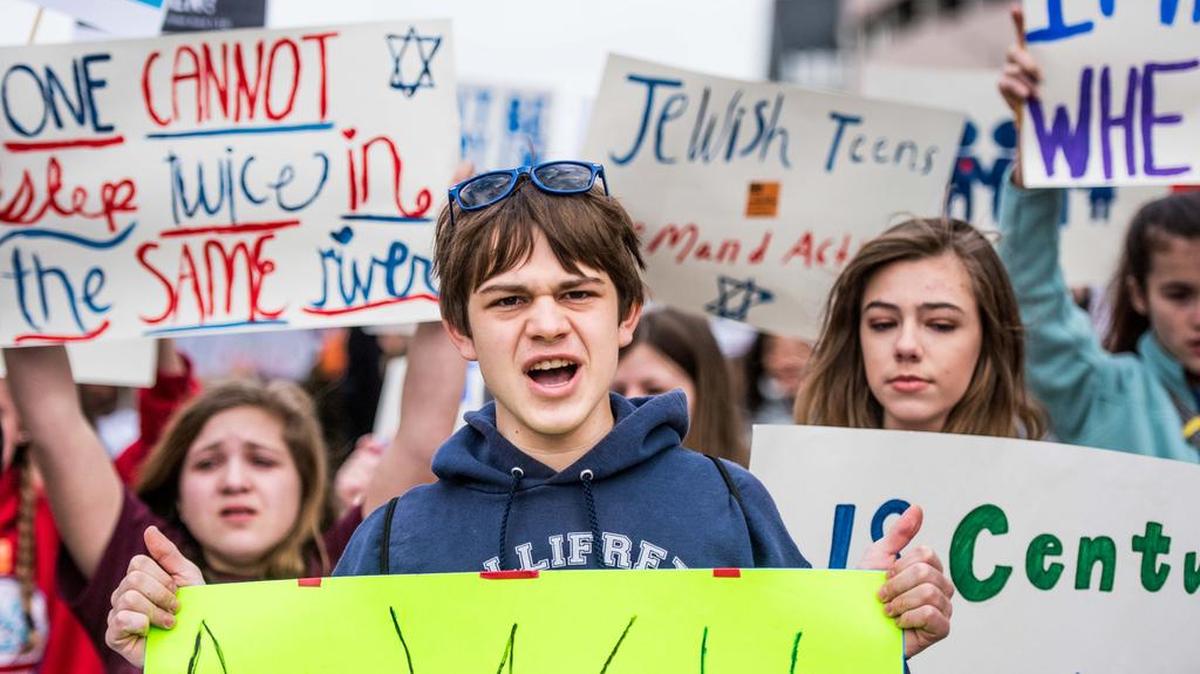 Students march toward the South Carolina State House during Saturday’s March for Our Lives event, one of hundreds of events nationwide demanding that lawmakers take action to end gun violence.