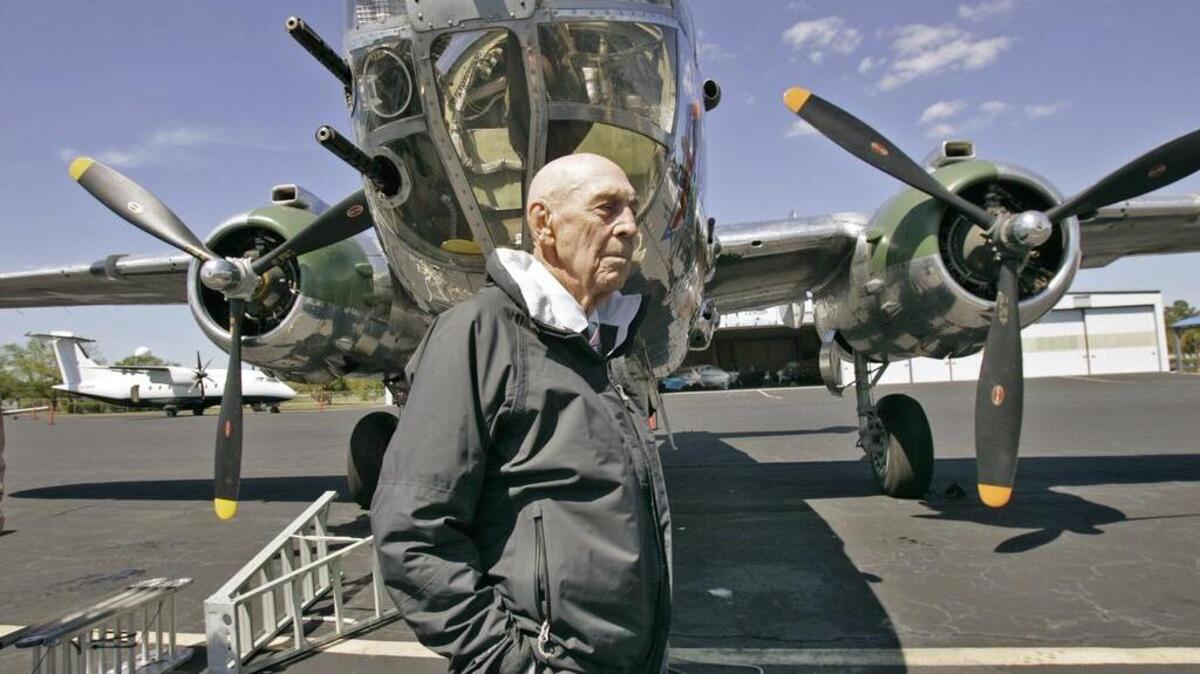 Retired Lt. Col. Richard "Dick" Cole, the last of the 80 Doolittle Tokyo Raiders who carried out the daring U.S. attack on Japan during World War II, died Tuesday at a military hospital in Texas. He was 103. Here, Cole walks around a vintage WW II B-25 bomber at Columbia Metropolitan Airport before taking a flight on Thurs. Apr. 16, 2009.