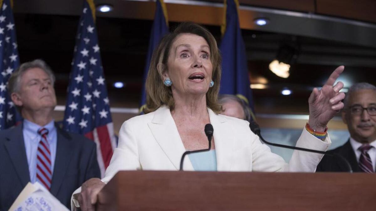 House Minority Leader Nancy Pelosi, D-Calif., flanked by, Rep. Frank Pallone, D-N.J., and Rep. Bobby Scott, D-Va., discusses the Republican efforts to replace Obamacare.