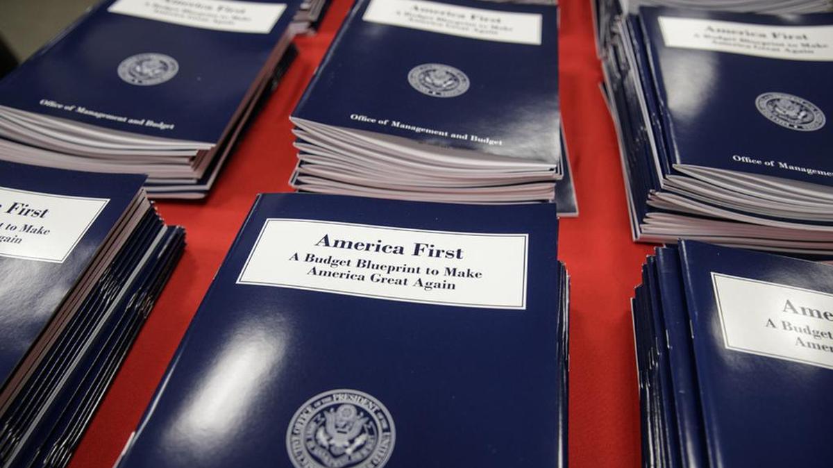 Copies of President Donald Trump’s first budget are displayed at the Government Printing Office in Washington.