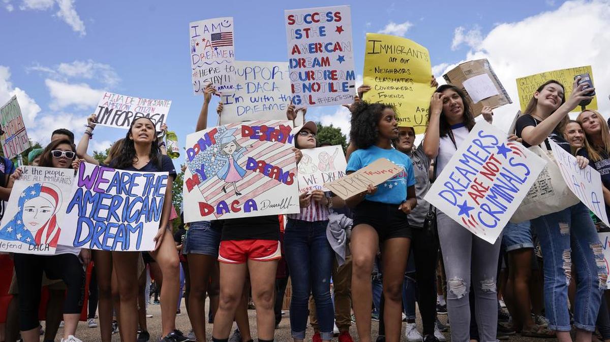 Supporters of Deferred Action for Childhood Arrival program demonstrate in front of the White House after President Donald Trump ordered an end in six months to protections for young immigrants who were brought into the country illegally as children but asked Congress to restore the protections.