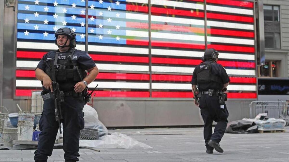 Heavily armed police officers stand guard after the September terrorist attack in Chelsea, a primarily residential neighborhood on Manhattan’s west side.