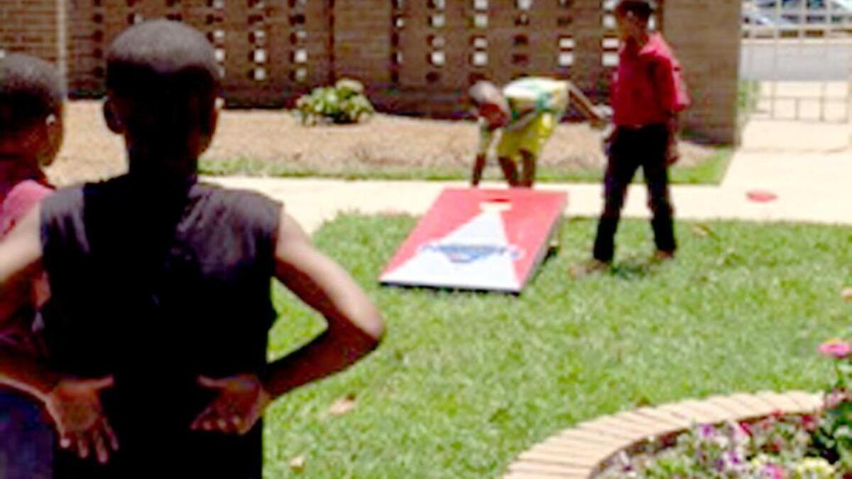 Corn hole is a popular game at the Salvation Army summer day camp.