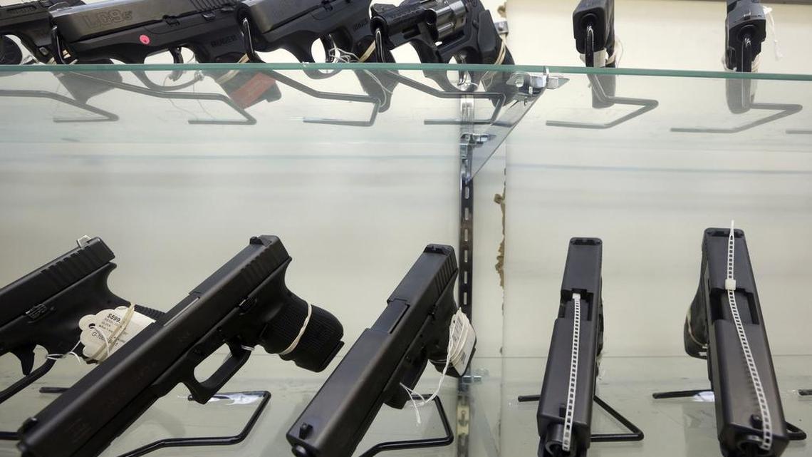 This Wednesday, June 29, 2016, photo shows guns on display at a gun store in Miami. (AP Photo/Alan Diaz)