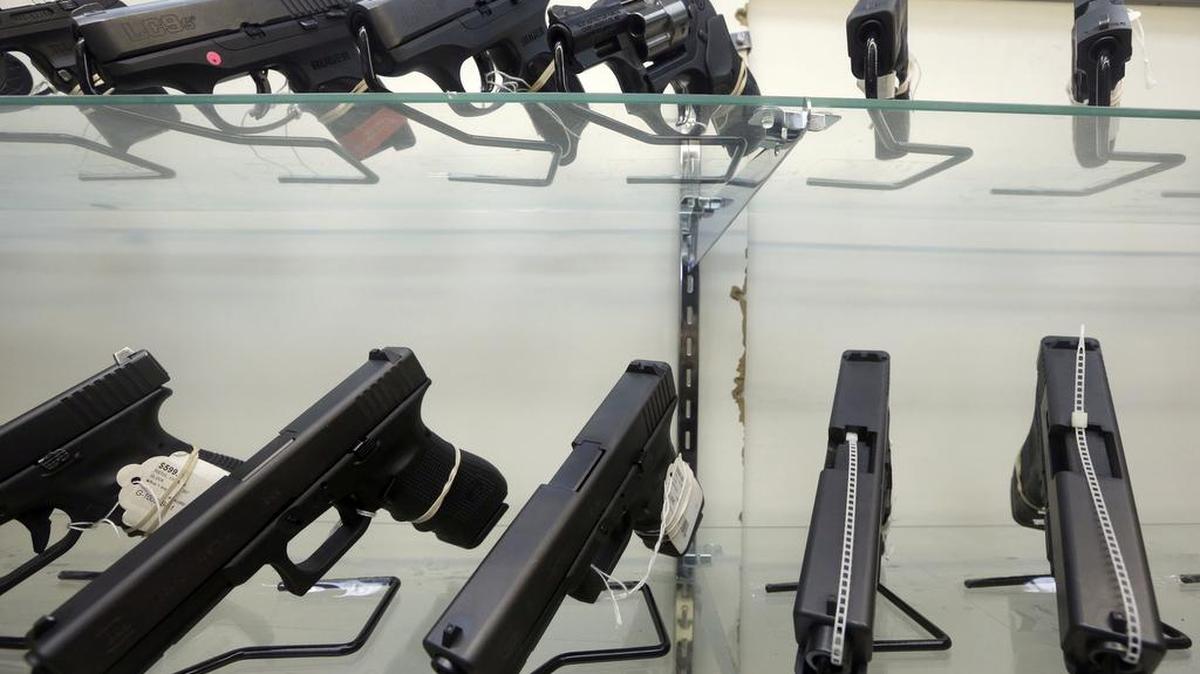 This Wednesday, June 29, 2016, photo shows guns on display at a gun store in Miami. (AP Photo/Alan Diaz)