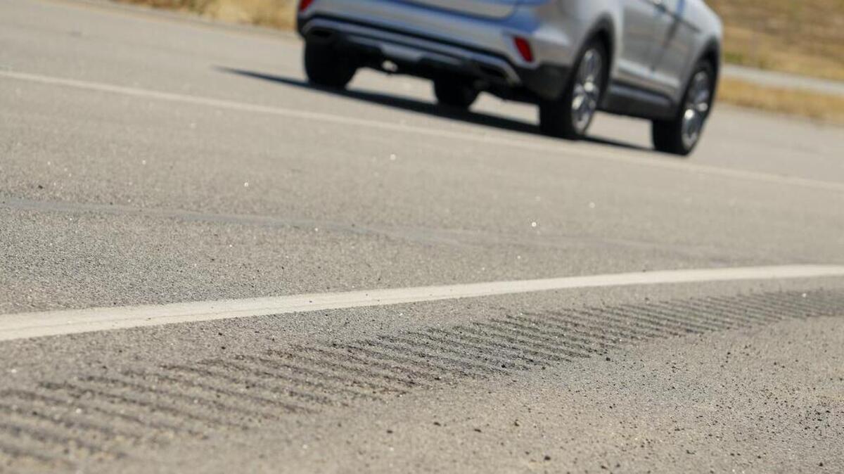 Why not put rumble strips in the middle of the road too?