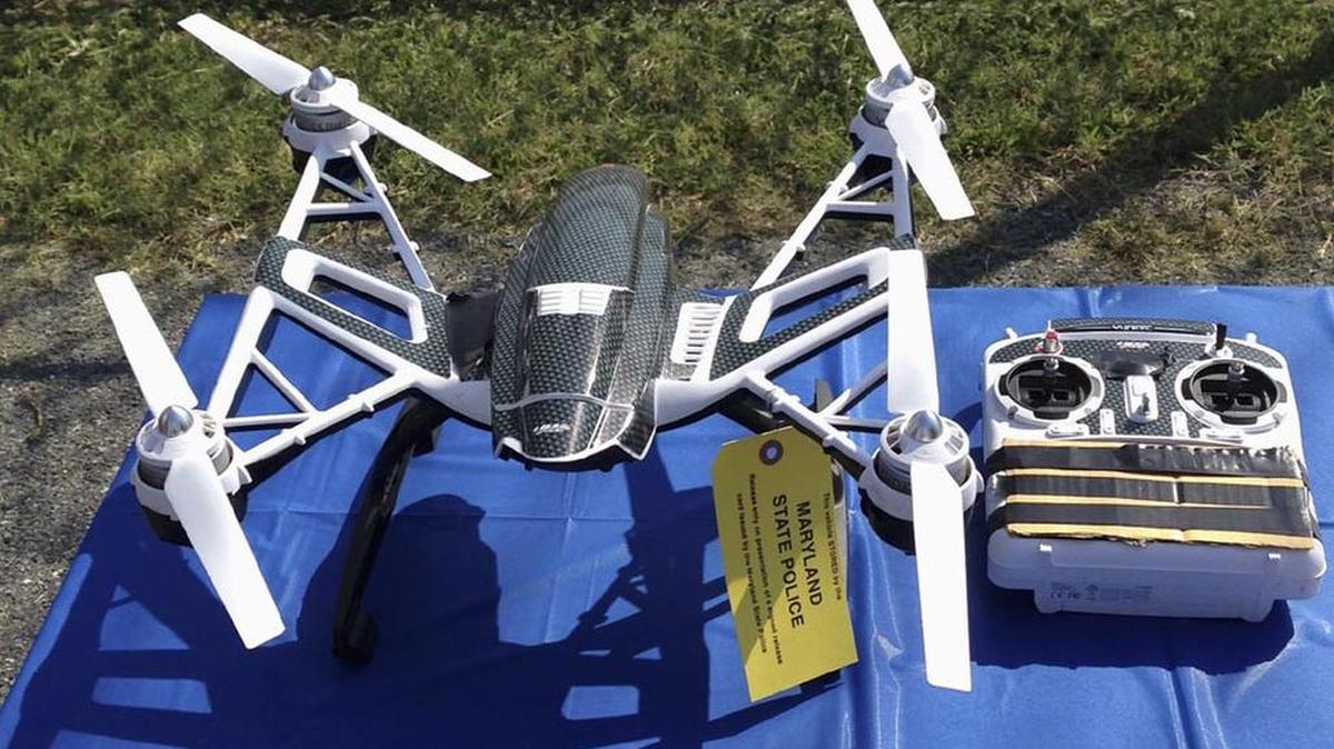 Maryland State Police and prison officials said two men planned to use this drone and controller to smuggle drugs, tobacco and pornography videos into the maximum-security Western Correctional Institution.