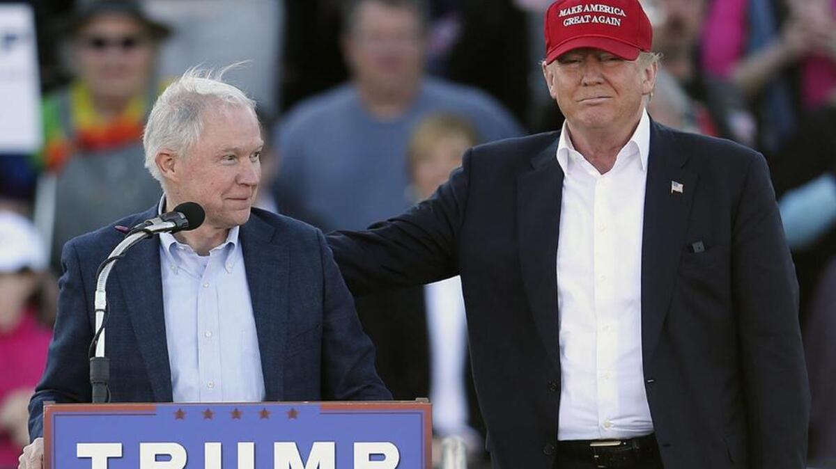 Donald Trump stands with Sen. Jeff Sessions at a February rally in Alabama.